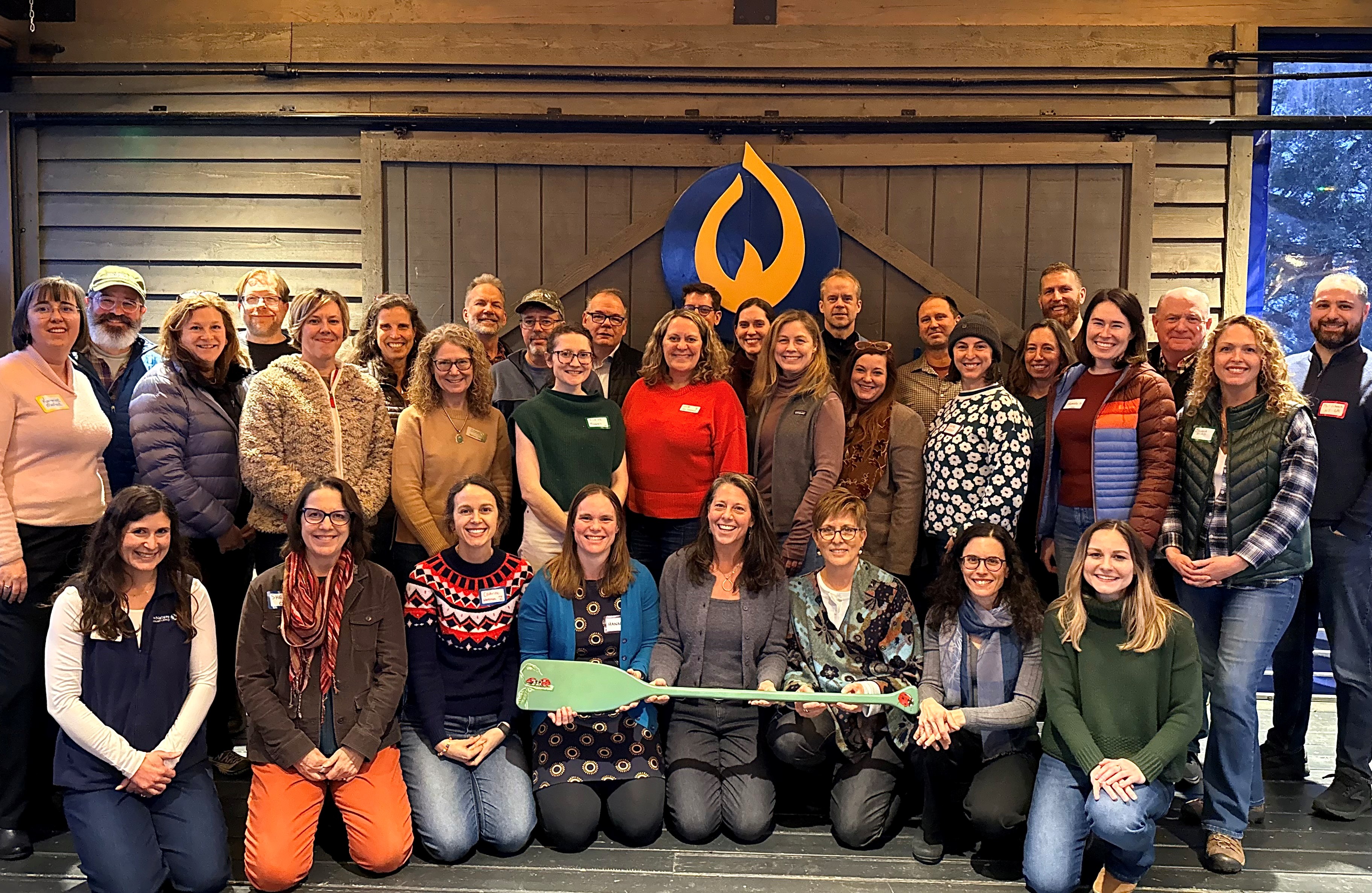 A group of people pose for a photo.