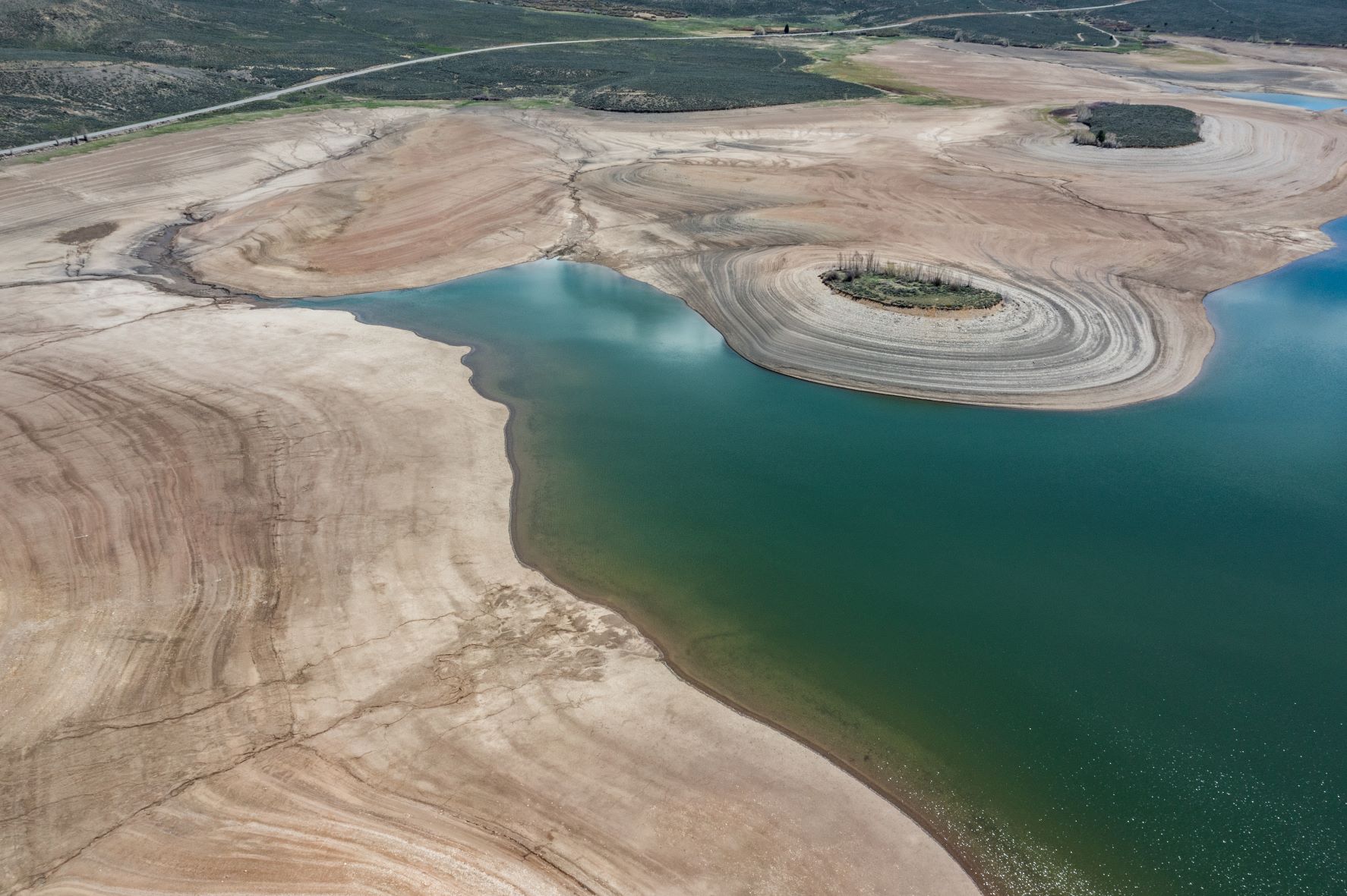 Aerial view of low water levels in a reservoir.