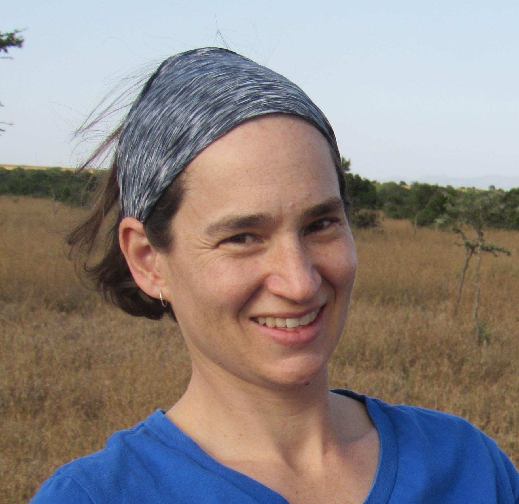 Headshot of Corinna Riginos.