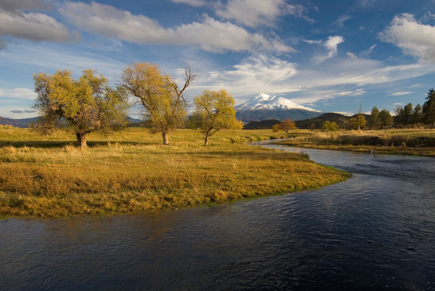 The Shasta River shown flowing through The Nature Conservancy's Shasta Big Springs Ranch below Mount Shasta in northern California. 