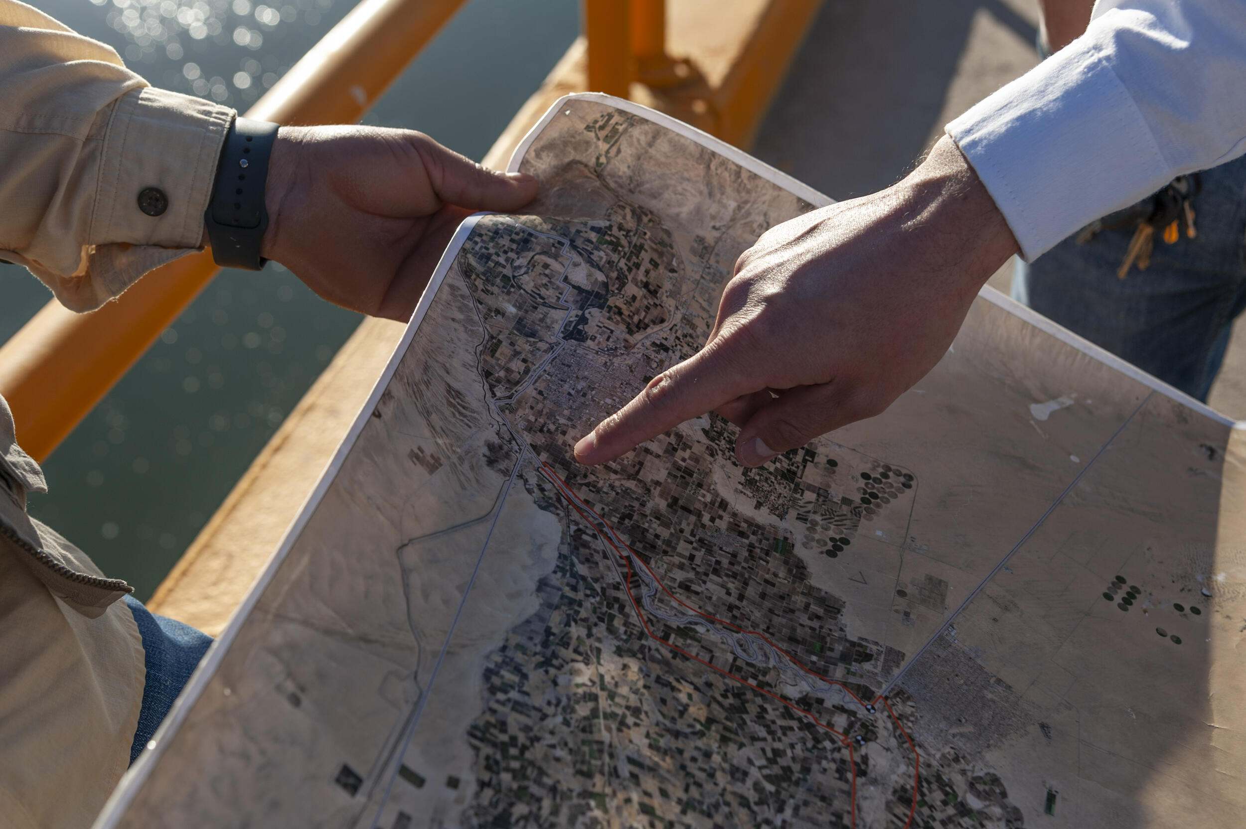 TNC employees at the Colorado River delta examine a map