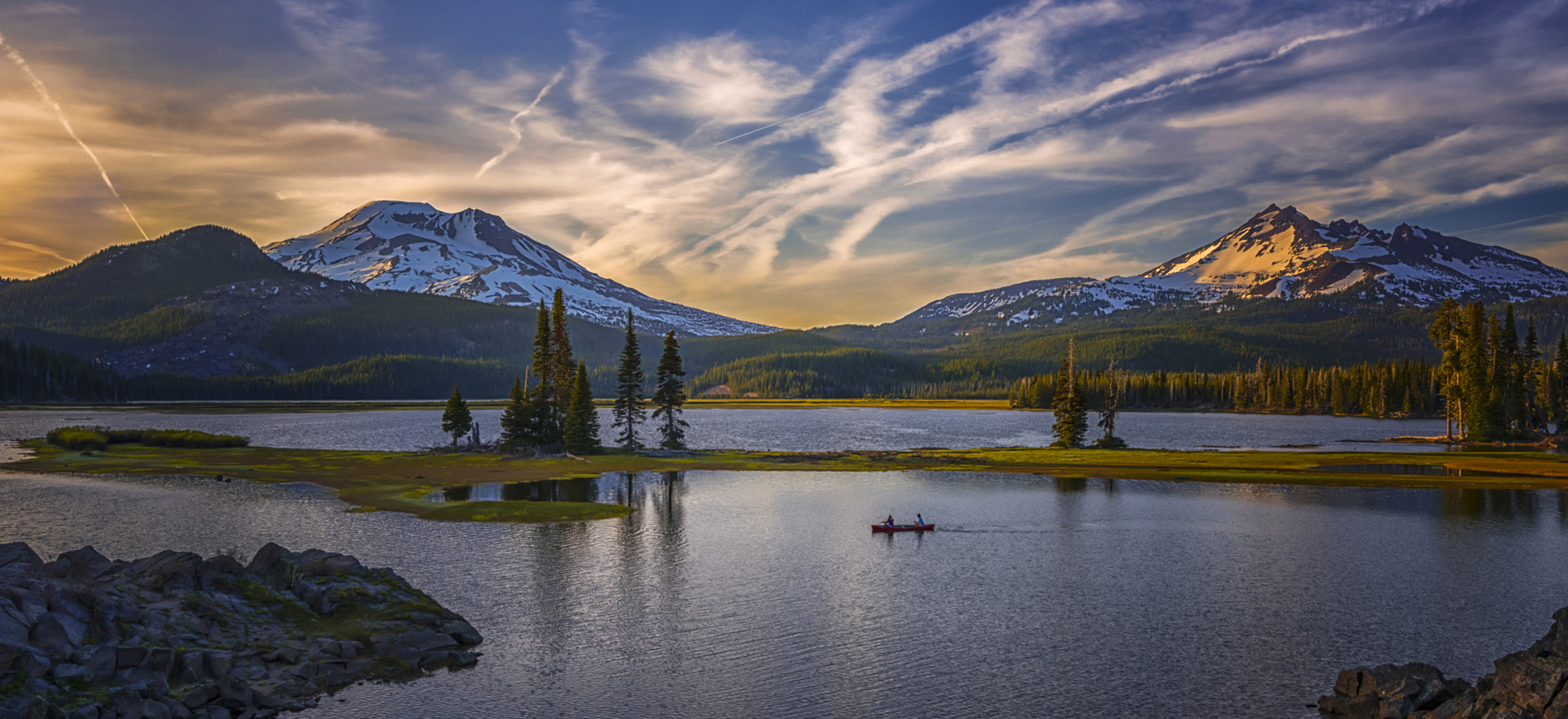 A lake surrounded by mountains.
