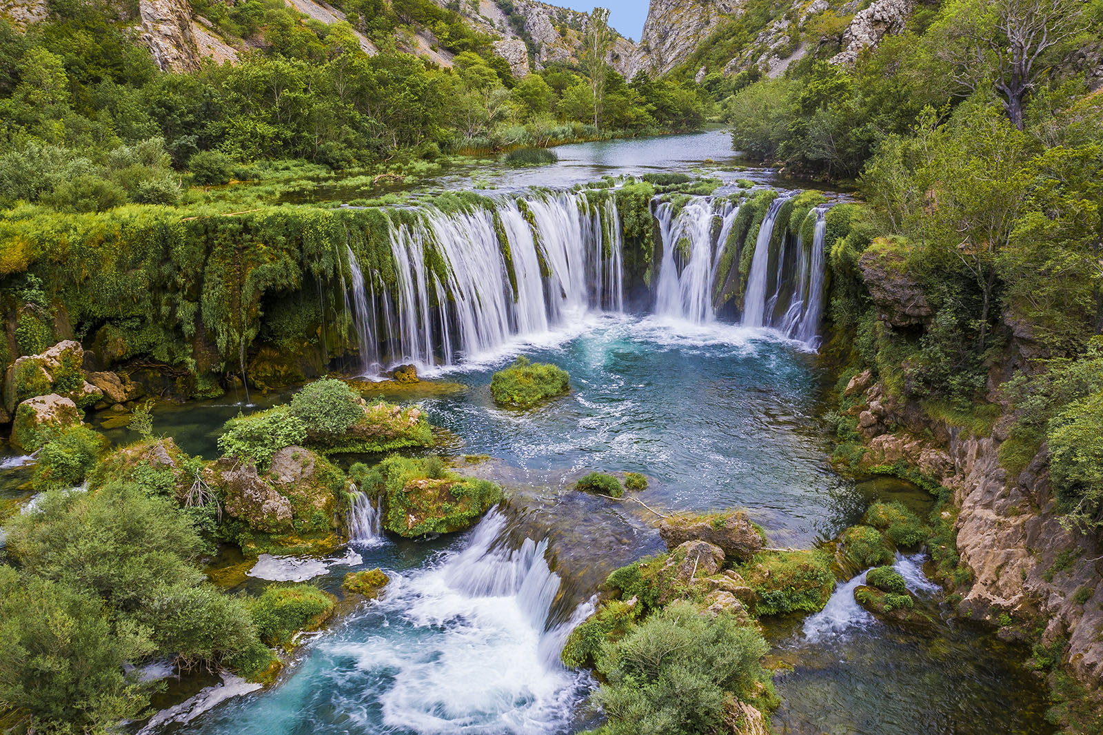A canyon of the Zrmanja that reaches a waterfall.
